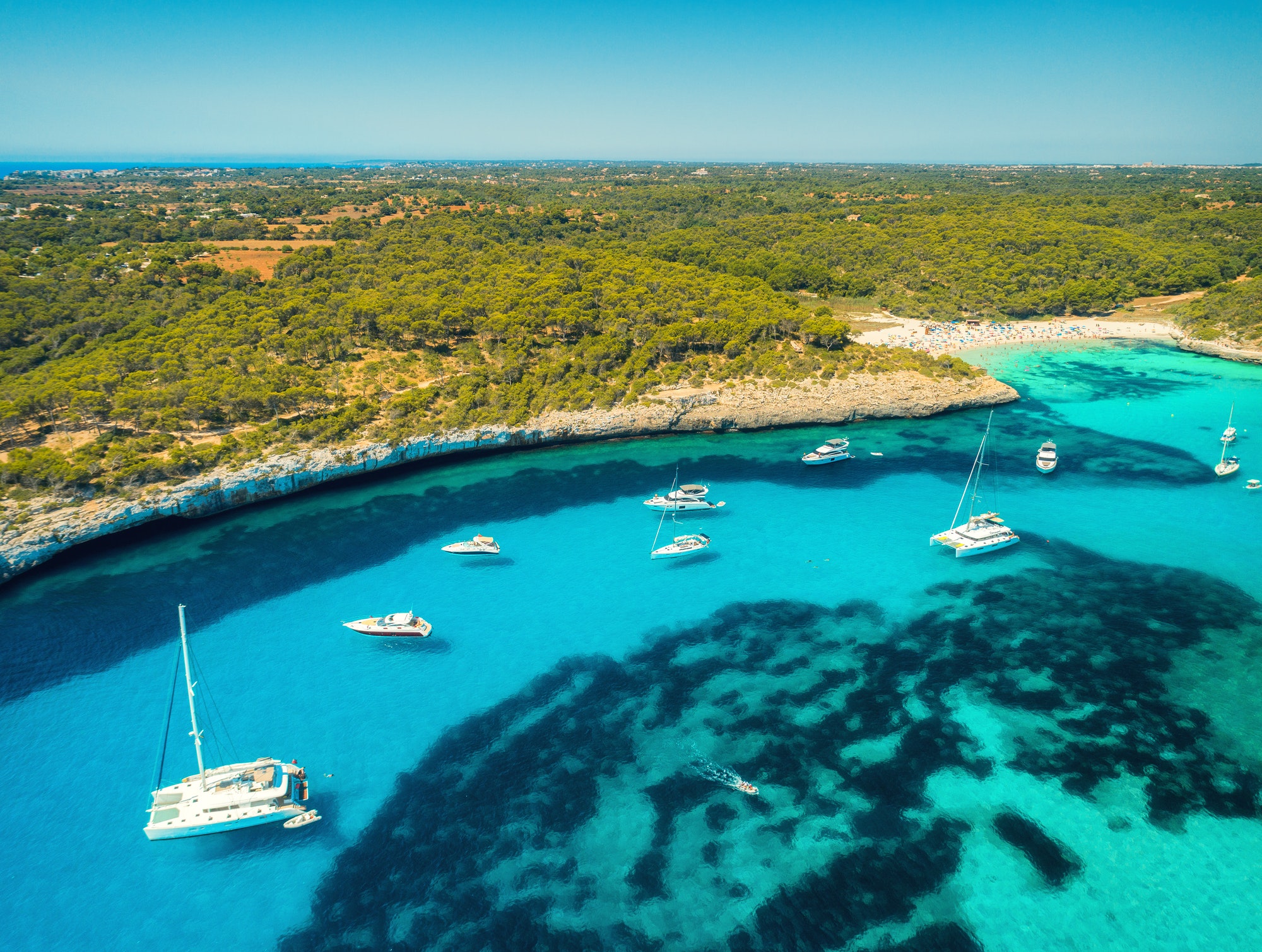 Aerial view of boats, luxury yachts on the sea in sunny day